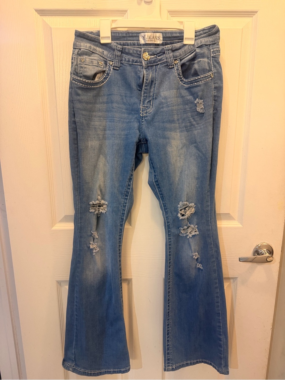 Women's Distressed Flare Jeans - Light Blue